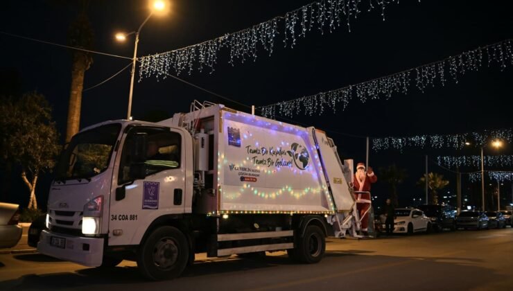 Çöp kamyonlarını ışıklarla süsleyen Kuşadası Belediyesi, yeni yılda çevre temizliğine dikkat çekti