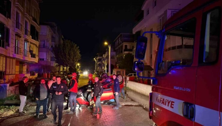 Edremit’te park halindeki araca çarpan otomobil takla attı