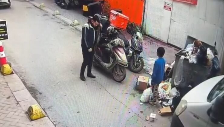 Soğukta üşüyen çocuğa ceketini çıkarıp veren kurye kameraya yansıdı